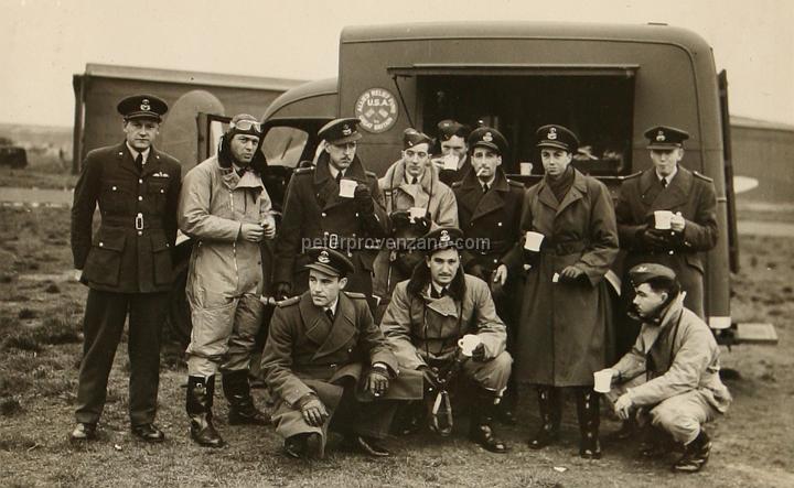 Peter Provenzano Photo Album Image_copy_020.jpg - The 71st Eagle Squadron taking a break from training at the YMCA canteen truck.  Peter Provenzano is standing third from the right.  RAF Station Sealand, October 1940.